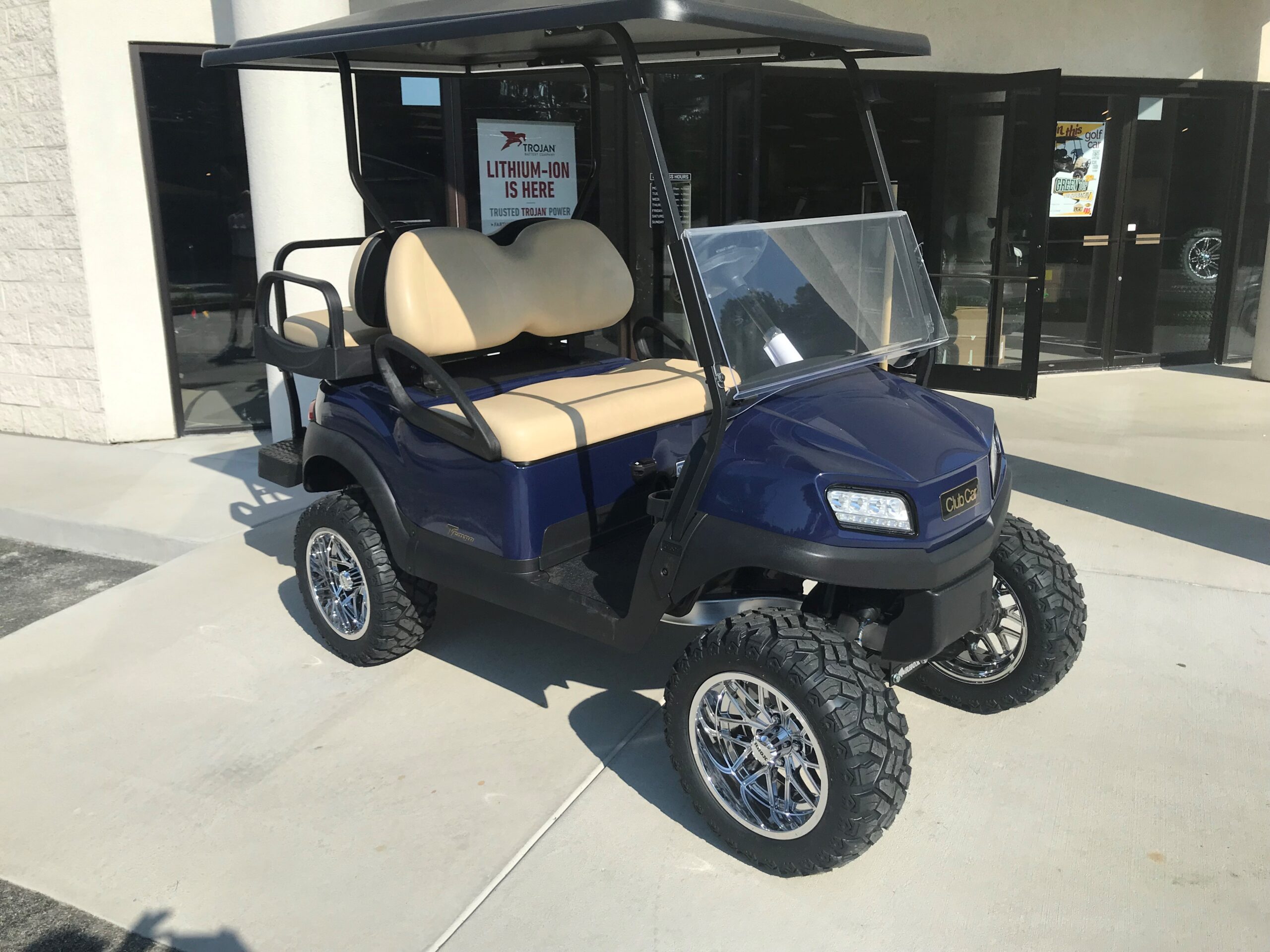 2023-club-car-tempo-4-pass-lifted-electric-golf-car-sapphire-peebles